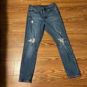 Levi’s 501 Skinny jeans w/ rips at the knee (intentional), size 26, medium wash